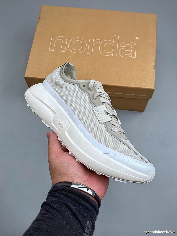 Norda Light Gray Trail Runners Highlighting Treaded Trail Sole